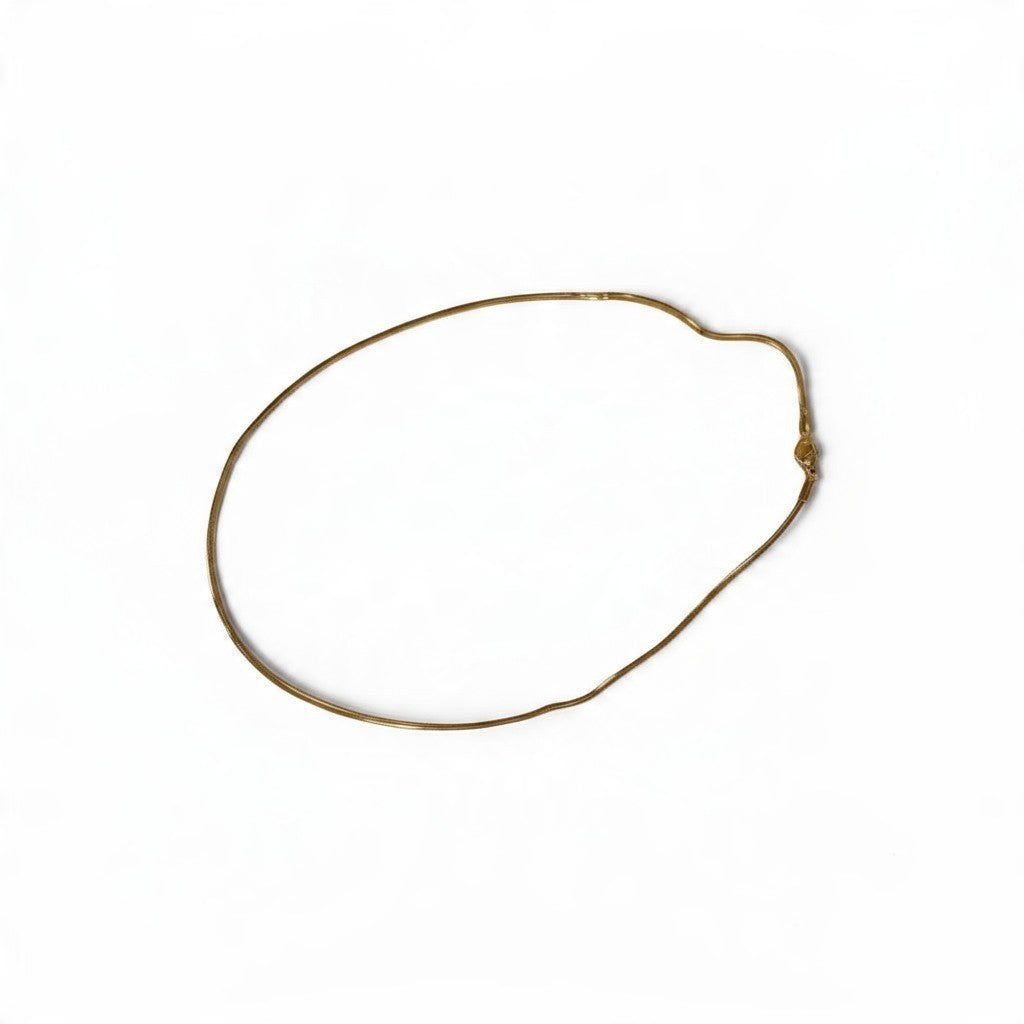 CameroonJewels Fil Doré delicate 18K gold-plated steel chain necklace on a white background
